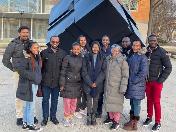 UMAPS winter 2023 cohort group photo in front of The Cube.